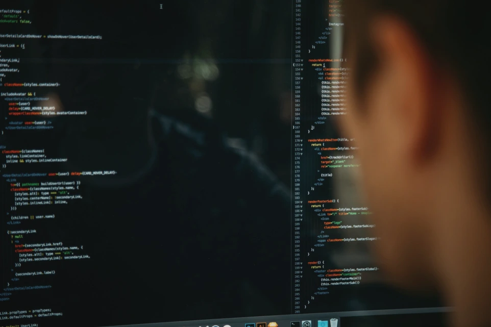 person facing computer desktop